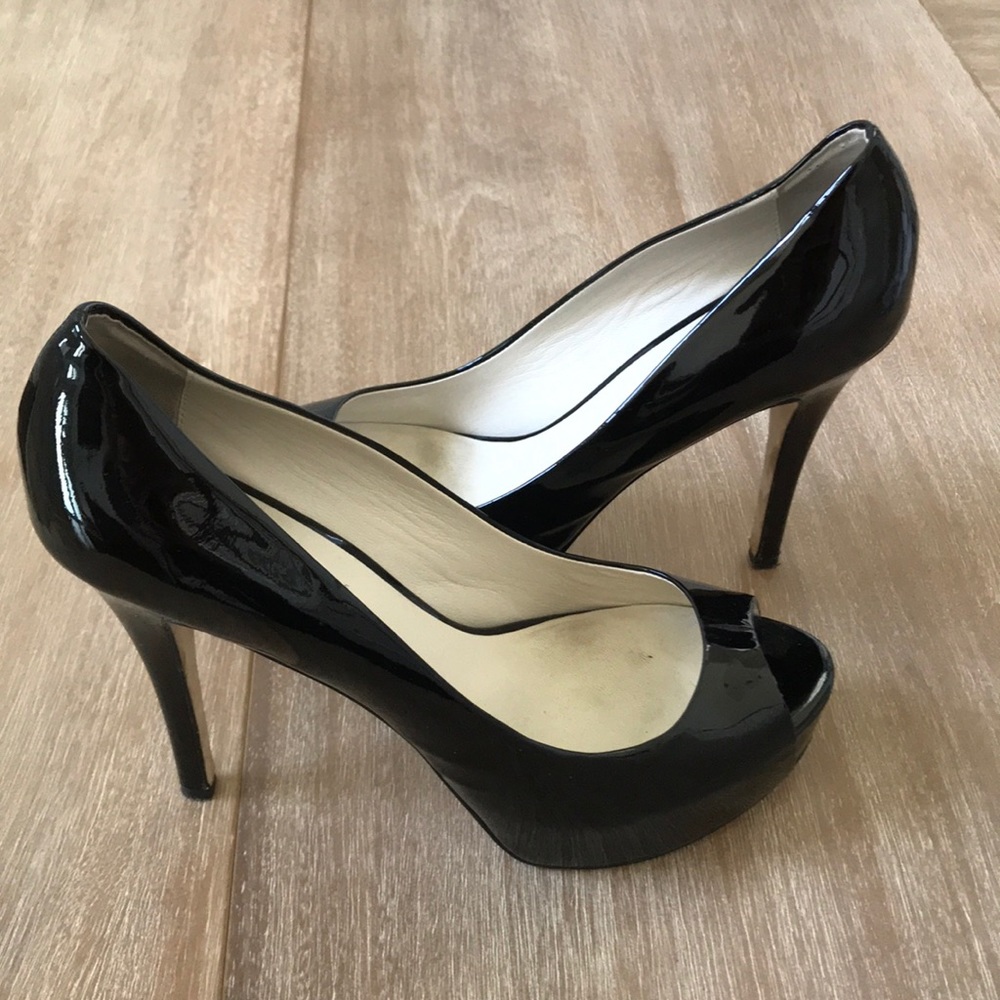 Barney’s New York black patent peep hole pumps